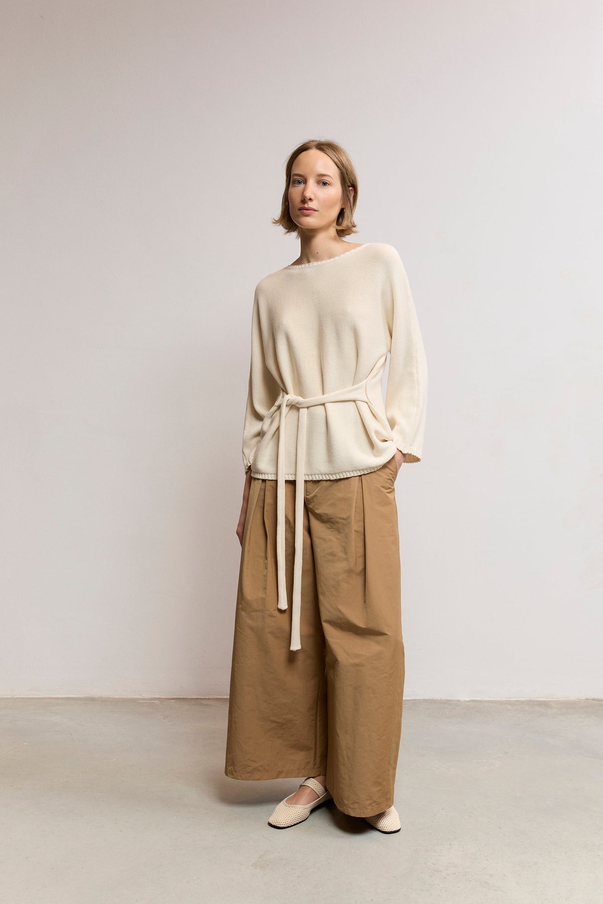 Belted knit sweater