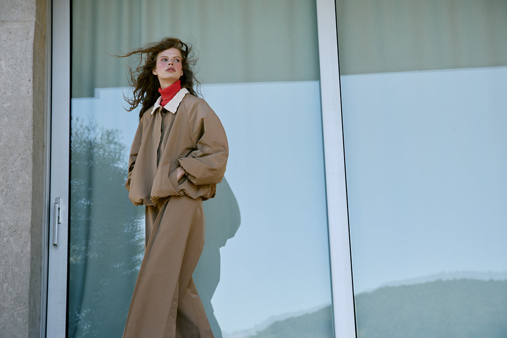 Woven trench with textured knit neck
