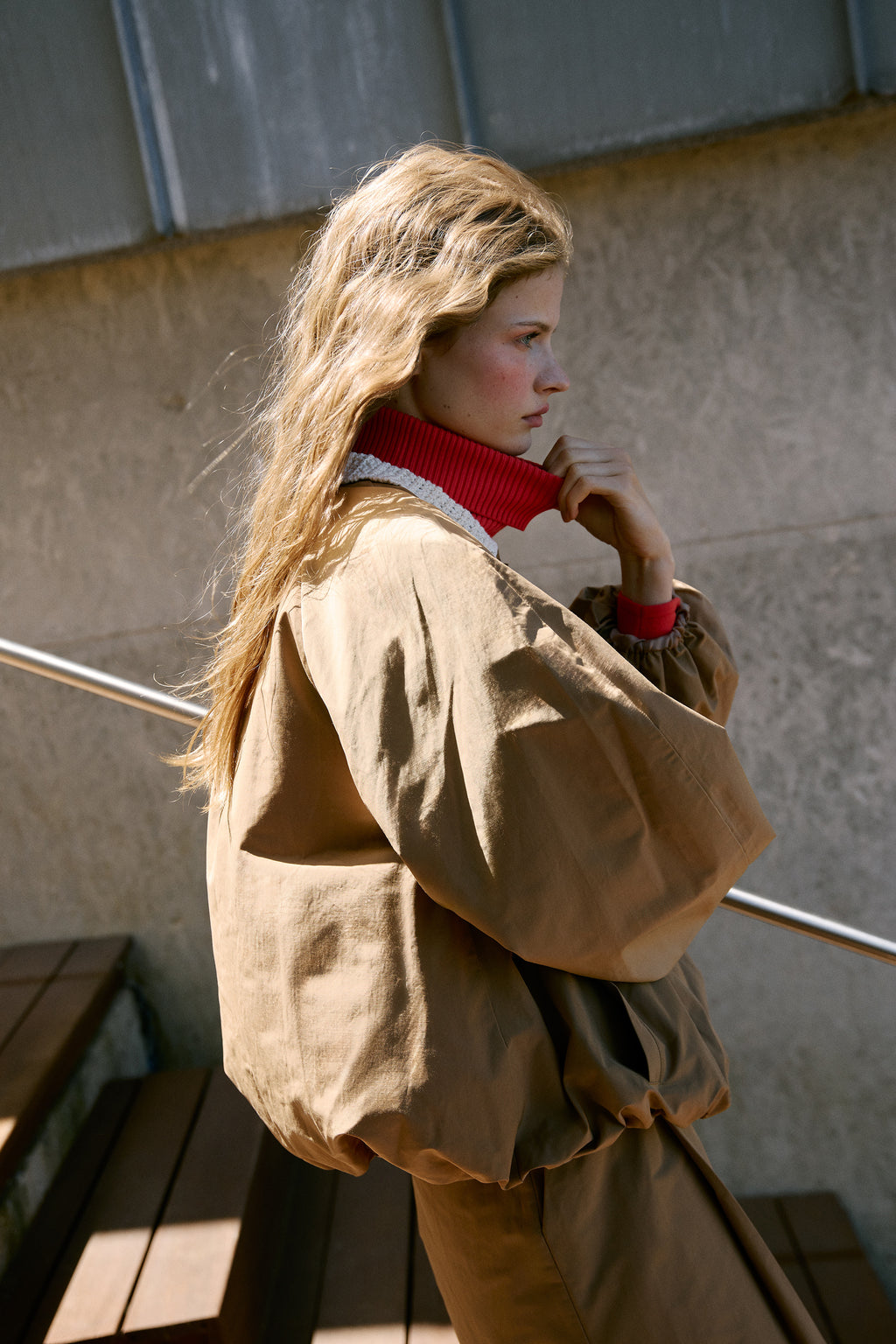 Woven trench with textured knit neck